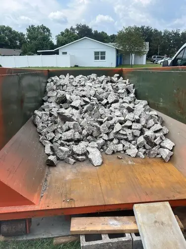Stone and debris cleared on a Champs demolition and junk removal job in Casselberry, FL