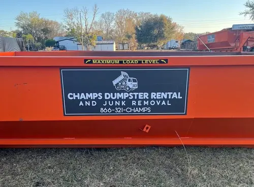 Dumpster placed to keep the driveway usable