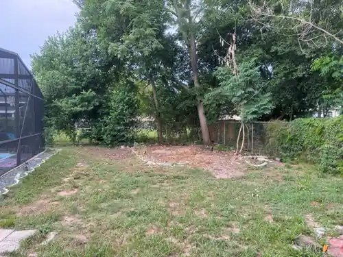 Clean, empty yard space after shed removal in Eustis, FL