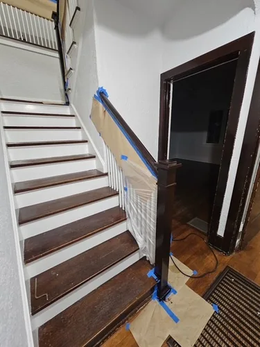 Lower staircase treads sanded and ready for stain in Winter Park