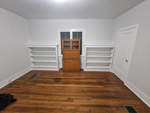 Built-in bookshelves next to the remodeled Orlando fireplace