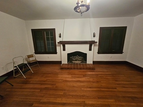 Orlando room remodel with a refinished fireplace and freshly painted walls